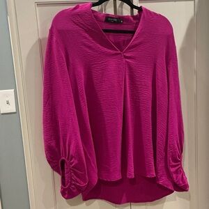 Ladies Eighteen gushiest blouse size medium.